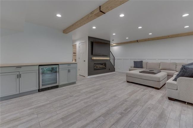 Basement Living Space w/ electric fireplace | Image 36
