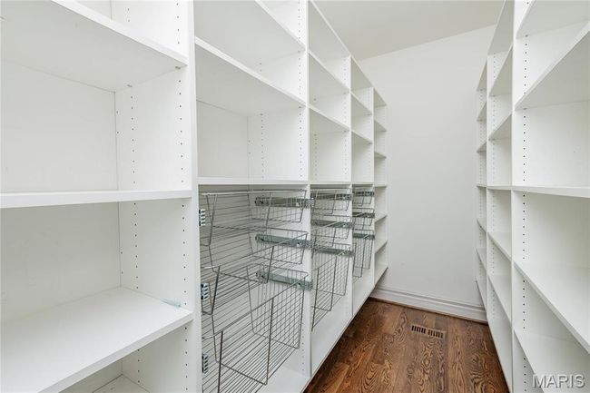 Spacious primary walk-in closet | Image 27