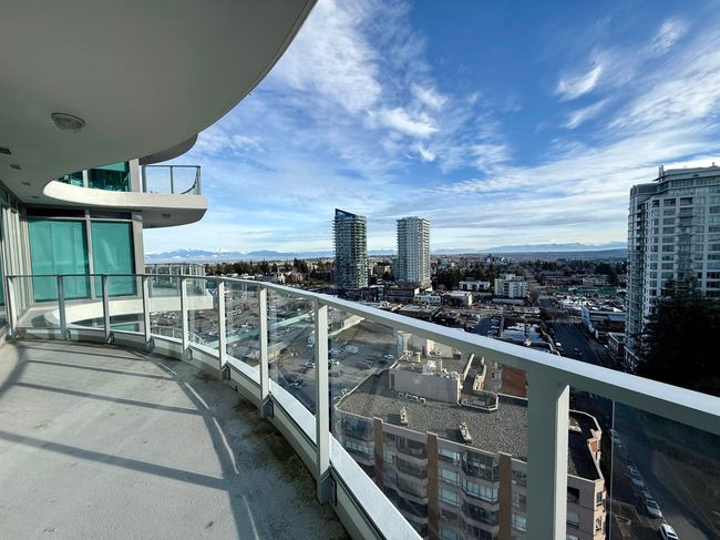 Balcony featuring a view of city | Image 15
