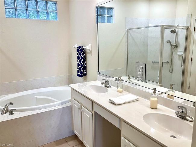 Primary dual vanity and tub | Image 14