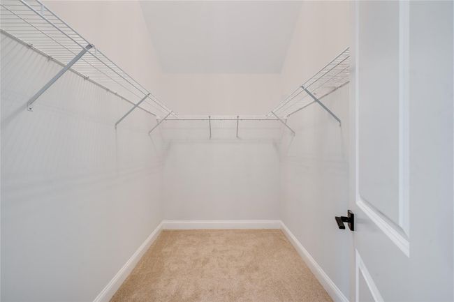 Full bath with marble finish floor, a sink, and baseboards | Image 22