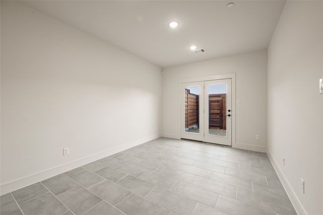 Whether it's a home office, craft space or workout room, the first floor flex space offers endless opportunity to make it your own! | Image 6