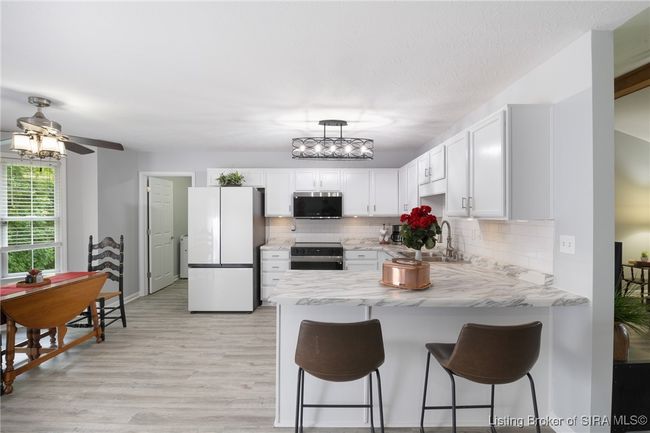 7463 Saddlebrook Ct, Home with 4 bedrooms, 3 bathrooms and null parking in Greenville IN | Image 4