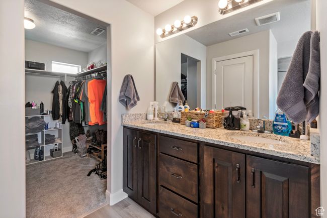 Full bath featuring visible vents and a sink | Image 11