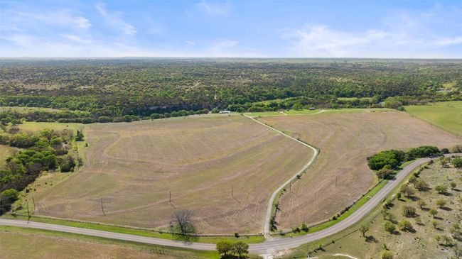 Birds eye view of property featuring a rural view and a view of trees | Image 12