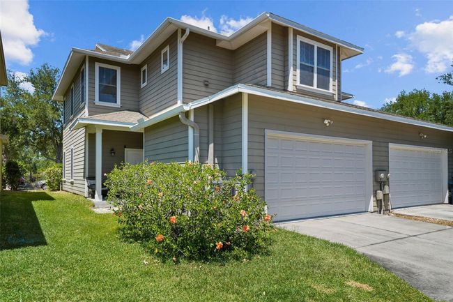 2 car garage features EV charger and storage space | Image 29