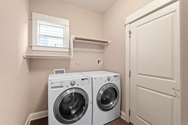 Convenient laundry room off the garage. | Image 33