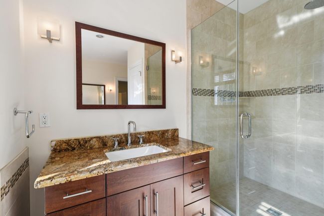 Full bathroom with a stall shower and Custom Wood Vanity | Image 24