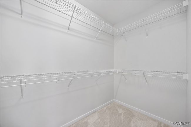 Walk in closet with carpet flooring HERS | Image 38
