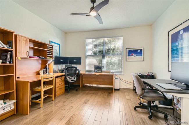 Bright and open den to be used as an office or as a guest bedroom. | Image 6