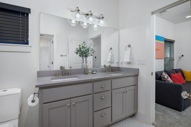 Secondary full bathroom on the main level. | Image 10