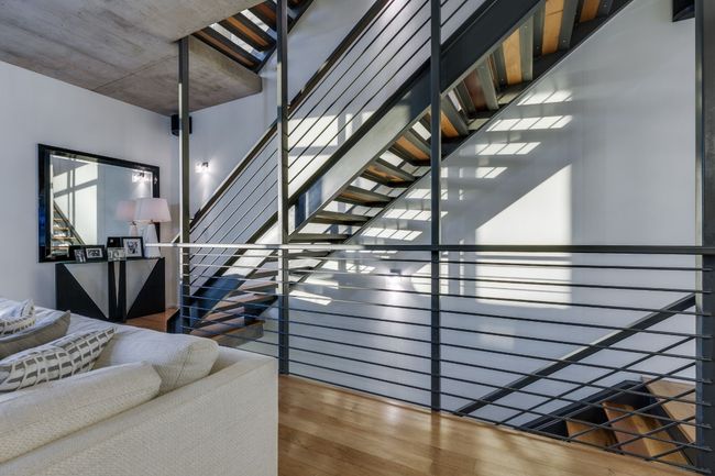 Stairs featuring hardwood / wood-style floors | Image 22