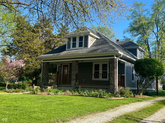 Relax on the comfortable front porch with only 2 homes on Wilson Way, a quiet street that is on the county line of Boone and Hendricks | Image 4