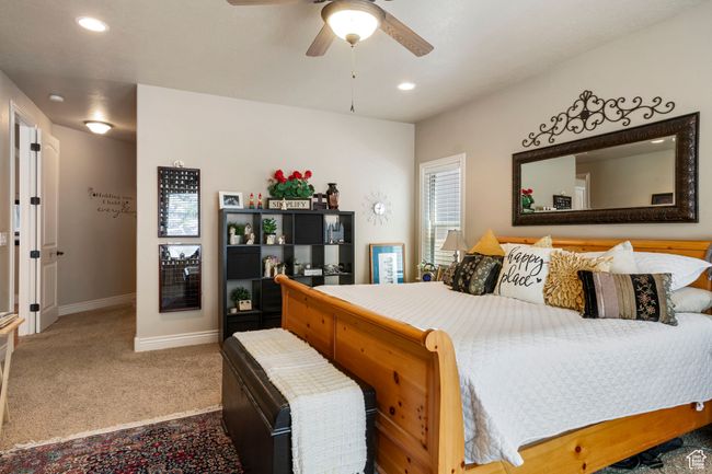 Bedroom with carpet flooring, recessed lighting, and a ceiling fan | Image 15