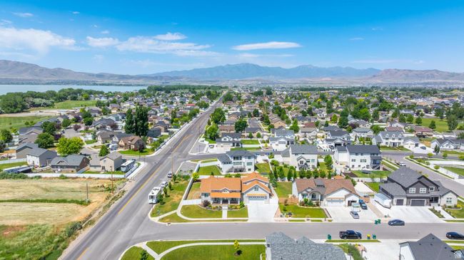 Aerial view of residential area featuring a water and mountain view | Image 37