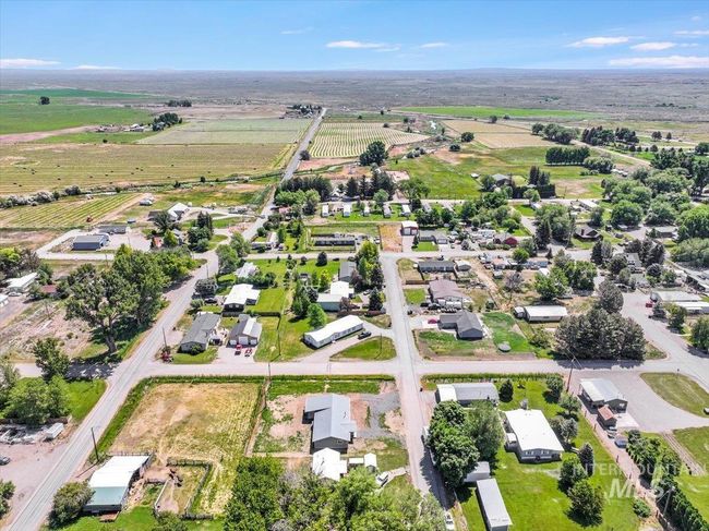 Aerial view of property and surrounding area with rural landscape and extensive farmland | Image 39