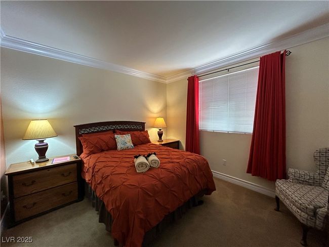 Bedroom with crown molding and carpet | Image 34