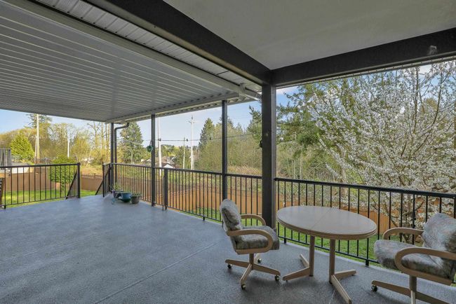 View of patio featuring a balcony | Image 35
