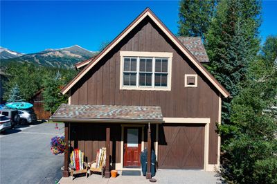 View of front of home featuring a garage and a mountain view | Image 1