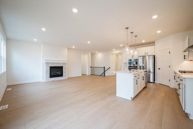 Photo of actual home. The open-plan layout of this home will make hosting a dream. | Image 4