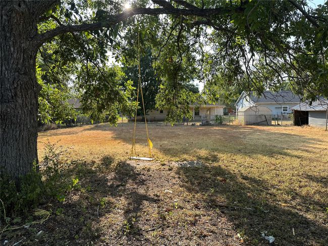 View of yard with fence | Image 36