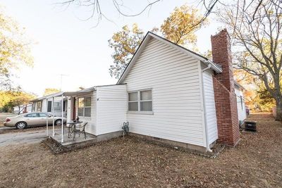 View of side of property featuring a patio area and central AC unit | Image 2