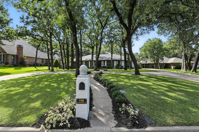 Ranch-style home featuring a front yard and a residential view | Image 8