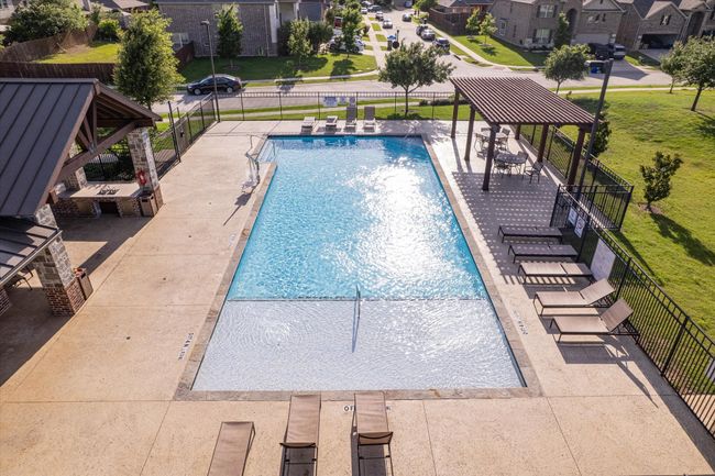 Community pool with a residential view, a gazebo, and a patio | Image 40