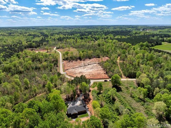 Property with vacant lot across street | Image 30