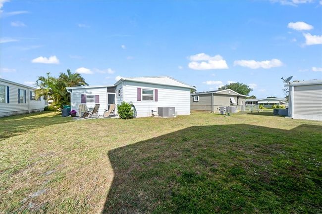 641 Hyacinth Cir, House other with 2 bedrooms, 2 bathrooms and null parking in Barefoot Bay FL | Image 24