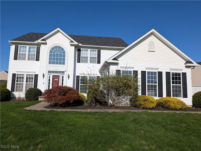 View of front of home featuring a front lawn | Image 1