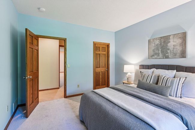 One of two lower level bedrooms, both with brand new carpet. | Image 46