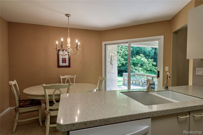 Kitchen opens to breakfast area | Image 5