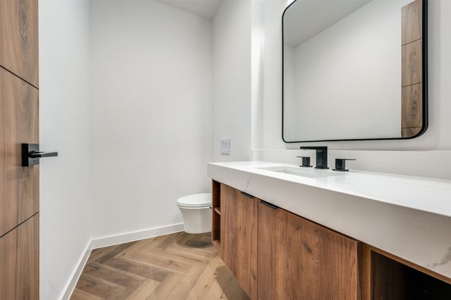 Half bath with toilet and vanity | Image 30