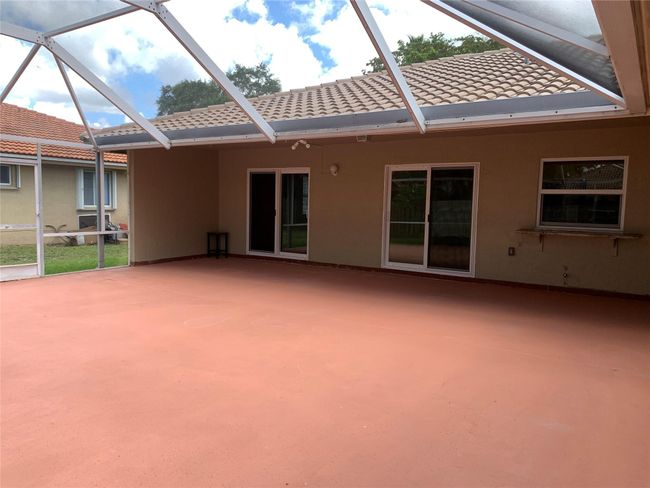 9840 Nw 28 Th Ct, House other with 4 bedrooms, 2 bathrooms and null parking in Coral Springs FL | Image 9