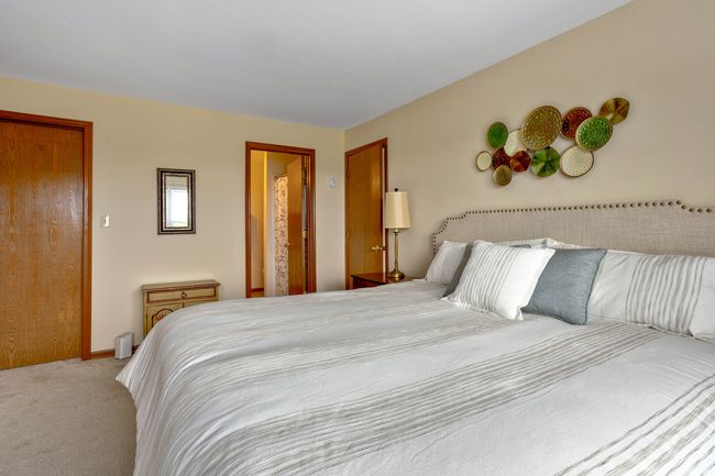 Primary suite with walk-in closet and private full | Image 11