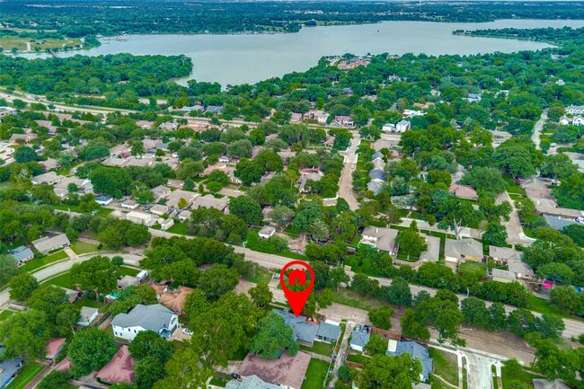 Aerial perspective of suburban area featuring a nearby body of water | Image 38