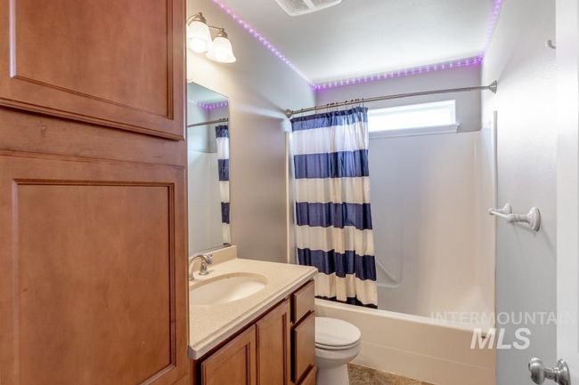 Full bath with vanity and shower / tub combo with curtain | Image 21