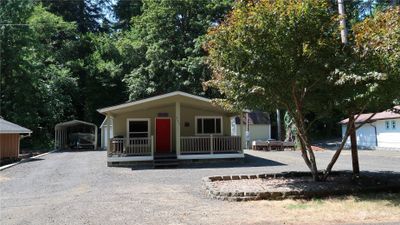 Front of home with a nice size cover porch to enjoy | Image 2