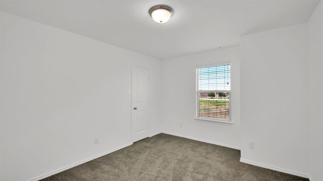 Spare room featuring carpet and baseboards | Image 32