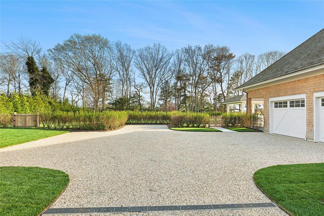 View of yard with fence and driveway | Image 41