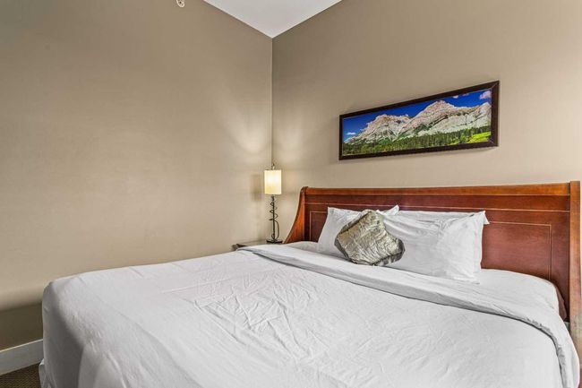 402 - 191 Kananaskis Way, Condo with 3 bedrooms, 3 bathrooms and 1 parking in Canmore AB | Image 24