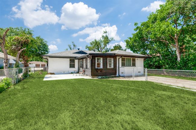 Large Patio was just replaced and Long Double Driveway provides Extra Parking! | Image 12