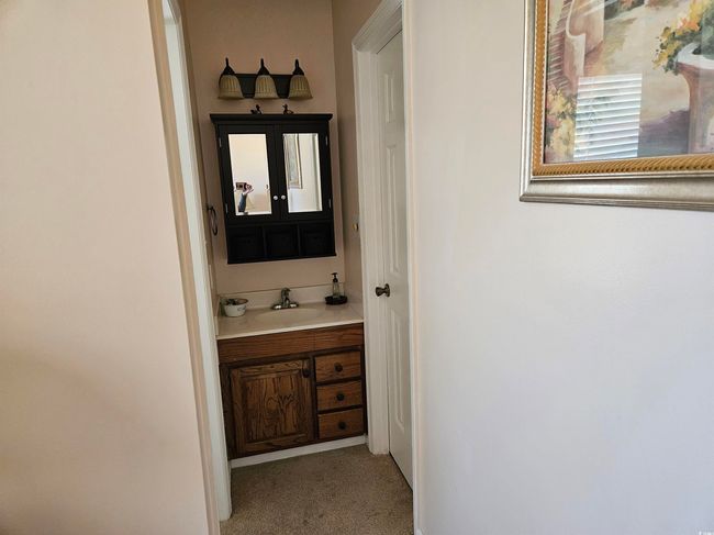 Bathroom featuring vanity | Image 16