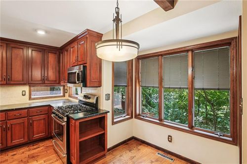 12 Woodland Trl, Warrensburg, MO, 64093-2917 | Card Image