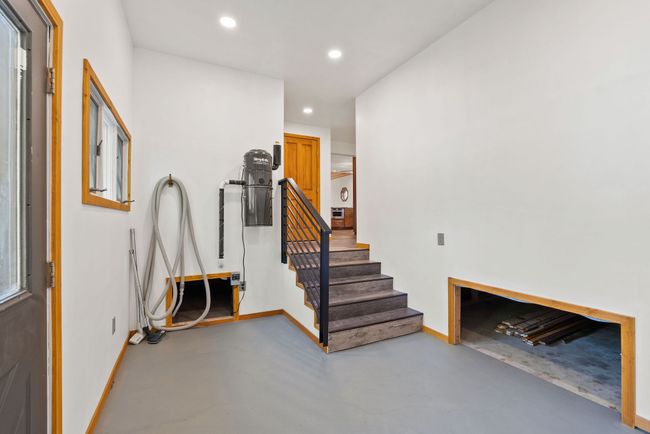 Mudroom with central vacuum and extra storage | Image 33