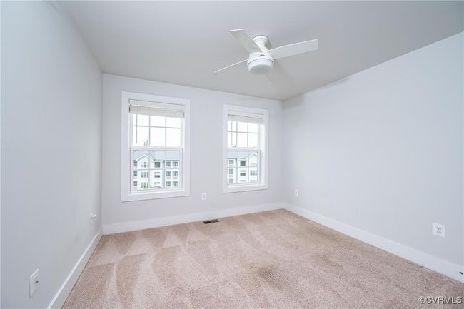 room with carpet floors and ceiling fan | Image 18