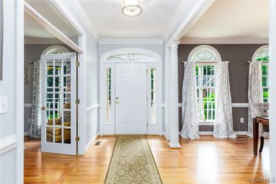 open foyer w/ custom trim | Image 3