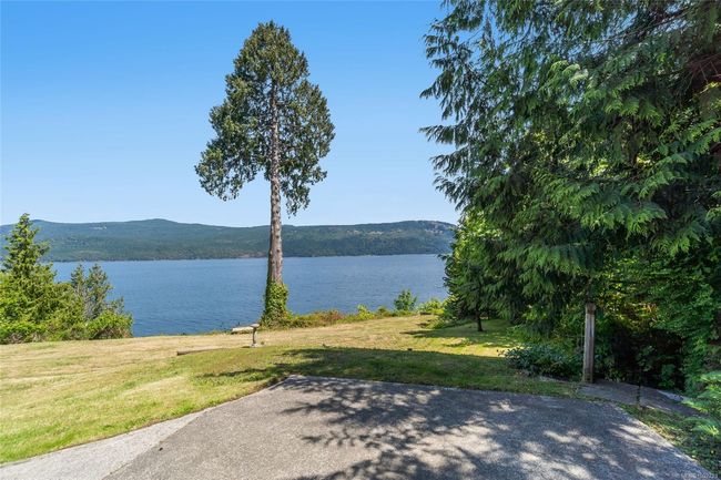 Water view with a mountain backdrop | Image 57