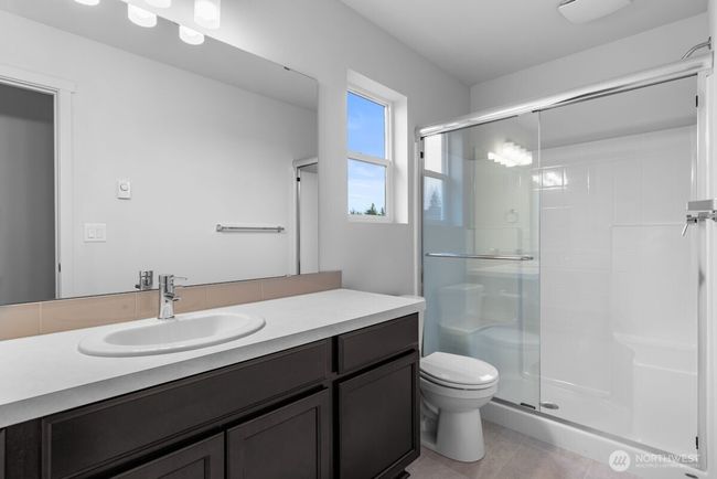 Photographs are for illustrative purposes only. Features, finishes, interior/exterior colors, landscaping and floorplan shown may vary from actual homes built. | Image 18